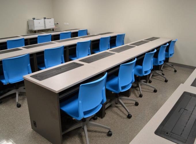 nova solutions trolley monitor lift desks at a college