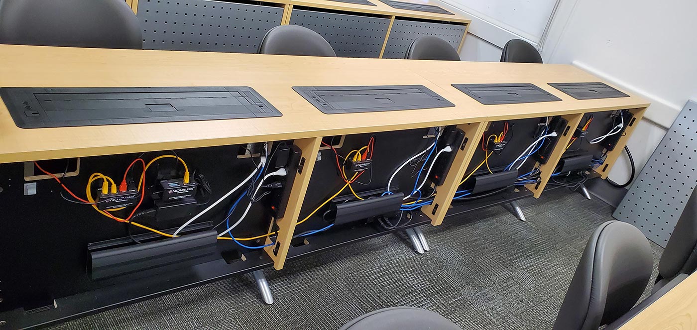 Wire management for computer desks and lecterns