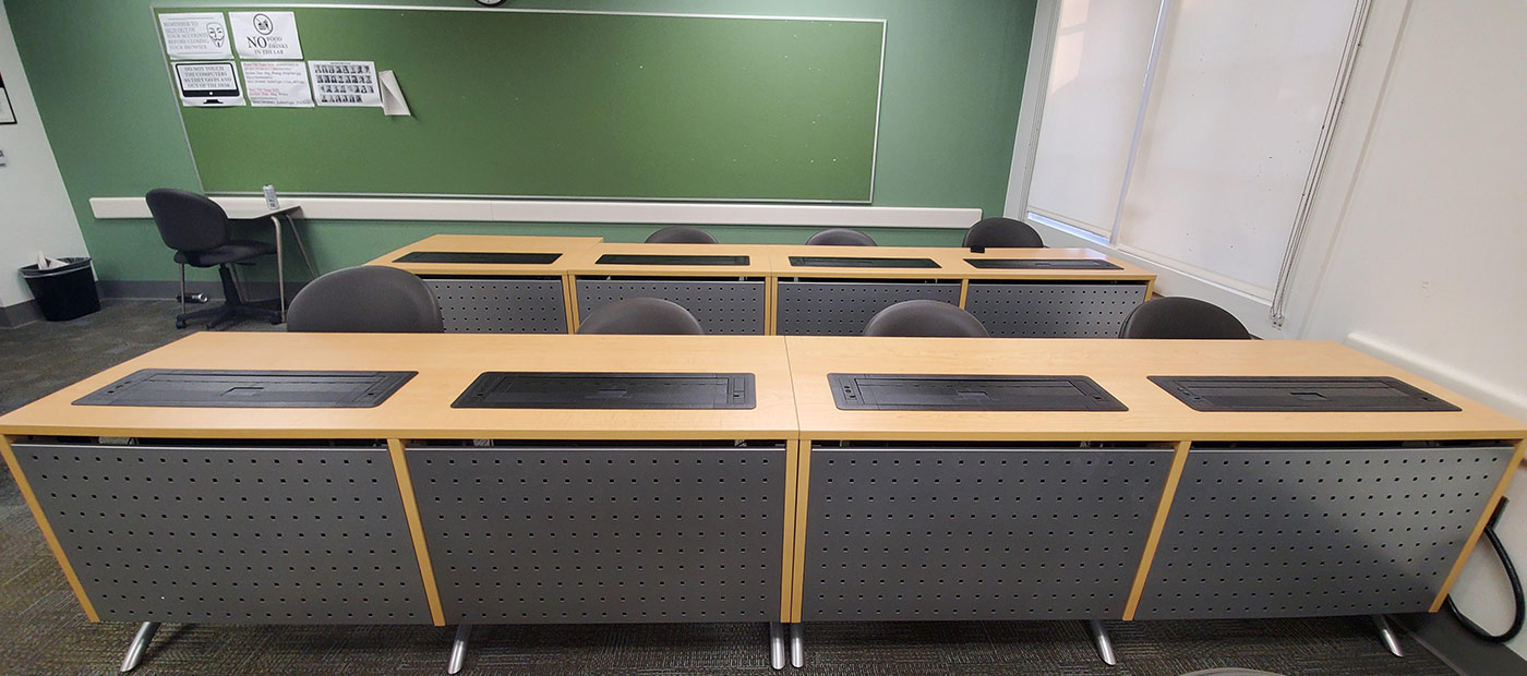 Wire and cable management for computer desks and lecterns